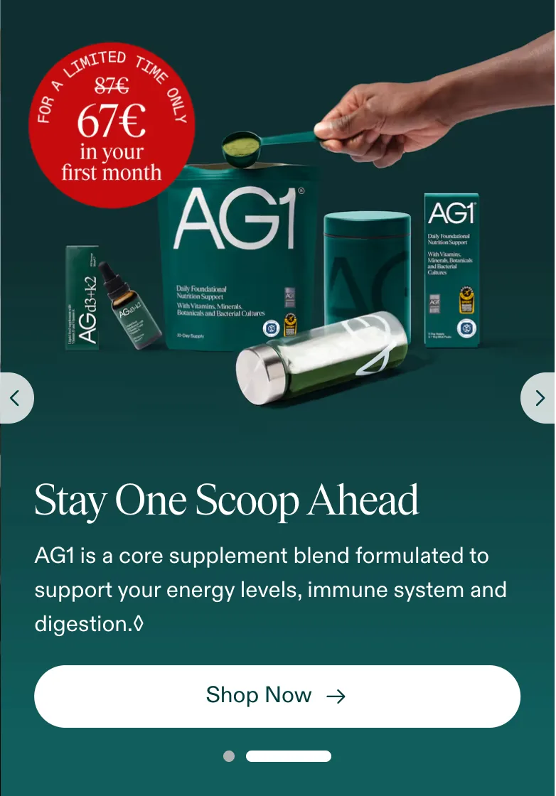 AG1 mobile hero — logo, cart, hamburger and a full-width carousel image with chevrons, no price or buy button